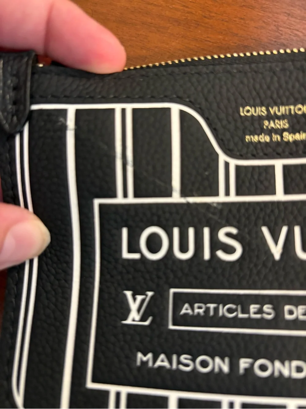 Louis Vuitton Black Pouch with Gold LV Zip Pull